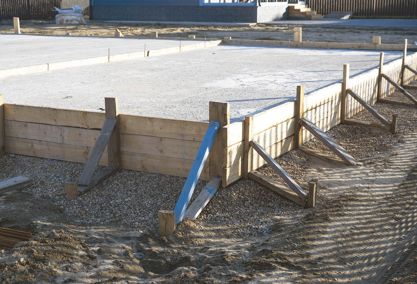Freshly poured concrete foundation for a new residential or commercial building.